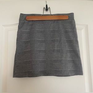 Gray and black plaid pencil skirt.